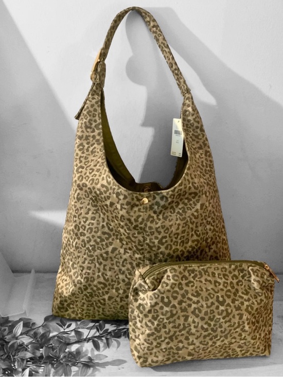 Anthropologie Handbags - NWT ANTHROPOLOGIE LOVE KNOT SLOUCHY TOTE W/POUCH